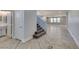 Inviting entryway features stylish tile flooring, stairs and plenty of natural light at 981 Soaring Moon Dr, Henderson, NV 89015