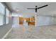 Spacious open kitchen with a large island, gray counters, and herringbone floors at 981 Soaring Moon Dr, Henderson, NV 89015