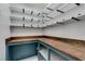 Walk-in pantry features custom wood countertops, shelves and great storage solutions at 981 Soaring Moon Dr, Henderson, NV 89015
