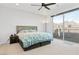 Bright bedroom features a large window with mountain views at 11548 Salt Creek Ave, Las Vegas, NV 89138