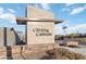 Crystal Canyon community entrance sign made from stone, with landscaping around it at 11548 Salt Creek Ave, Las Vegas, NV 89138