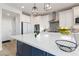 Beautiful kitchen with a large center island, pendant lighting, and modern appliances at 11548 Salt Creek Ave, Las Vegas, NV 89138