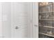 Well-organized walk-in pantry with glass shelving, providing ample storage space at 11548 Salt Creek Ave, Las Vegas, NV 89138