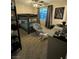 Bedroom with a bunk bed, ceiling fan, grey walls and carpet, and a desk at 12451 Island Bells Ave, Las Vegas, NV 89138