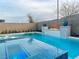 Swimming pool and spa with a fire feature with manicured landscaping at 12451 Island Bells Ave, Las Vegas, NV 89138