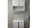 Storage area with modern cabinetry and stylish towel bar fixture at 12451 Island Bells Ave, Las Vegas, NV 89138