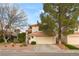 Charming two-story home with well-maintained landscaping, a two-car garage, and mature trees at 1708 Imperial Cup Dr, Las Vegas, NV 89117