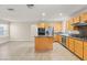 Modern kitchen with stainless steel appliances and a granite-topped island at 1708 Imperial Cup Dr, Las Vegas, NV 89117