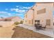 Backyard boasts a patio, desert landscaping, and ample room at 1804 Michael Ct, Henderson, NV 89014