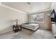Bright bedroom features a window that brings in natural light and neutral walls at 1804 Michael Ct, Henderson, NV 89014