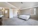 Expansive bedroom with carpet flooring, neutral walls, and natural light creates a serene ambiance at 1804 Michael Ct, Henderson, NV 89014