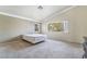 Bedroom features carpet flooring, natural light, and ample space for versatile furniture arrangement at 1804 Michael Ct, Henderson, NV 89014
