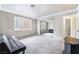 Well-lit bedroom features a large window and ample closet space for a cozy interior at 1804 Michael Ct, Henderson, NV 89014