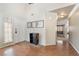 The front entry has hardwood floors, a large window for light, and decoratively framed art on the foyer wall at 1804 Michael Ct, Henderson, NV 89014
