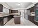 Spacious kitchen with stainless steel appliances, tile backsplash, and granite countertops at 1804 Michael Ct, Henderson, NV 89014