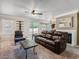 Relaxing living room with carpet floors, large windows and a fireplace offers a tranquil retreat at 1804 Michael Ct, Henderson, NV 89014