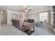 Comfortable living room with plush seating, decorative art, and neutral color palette at 1804 Michael Ct, Henderson, NV 89014