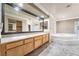 Lavish main bathroom with dual sinks and granite countertops and a large soaking tub at 1804 Michael Ct, Henderson, NV 89014