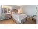 Comfortable bedroom with queen bed, side tables and window at 1835 Swallow Hill Ave, Henderson, NV 89012