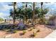 Landscaped community entrance with palm trees and prominent signage for Green Valley Ranch at 1835 Swallow Hill Ave, Henderson, NV 89012