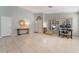 Bright and airy living space with tile floors, large windows, and ample room for furniture at 1835 Swallow Hill Ave, Henderson, NV 89012