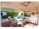 Charming covered patio features a dining table, grill area and brick flooring at 1835 Swallow Hill Ave, Henderson, NV 89012