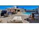 Entertainer's backyard featuring pool, spa, patio, and lush landscaping at 216 Candlelight St, Las Vegas, NV 89145