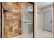 Walk-in shower features tile surround, and a glass enclosure at 216 Candlelight St, Las Vegas, NV 89145