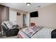 Cozy bedroom with a recliner and carpeted floors at 216 Candlelight St, Las Vegas, NV 89145
