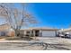 Charming single-story home featuring a well-kept front yard and a spacious two-car garage at 216 Candlelight St, Las Vegas, NV 89145