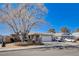 Inviting single-story residence with a lush front yard and a convenient two-car garage at 216 Candlelight St, Las Vegas, NV 89145