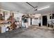 View of the garage featuring, storage, washer, dryer, and work area at 216 Candlelight St, Las Vegas, NV 89145