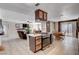 Spacious kitchen area flows to the dining area and living room for easy entertaining at 216 Candlelight St, Las Vegas, NV 89145