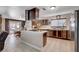 Open kitchen with a central island and stainless steel appliances, ideal for cooking at 216 Candlelight St, Las Vegas, NV 89145