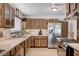 Bright kitchen featuring a large sink, stainless steel appliances and ample counter space at 216 Candlelight St, Las Vegas, NV 89145