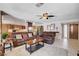 Inviting living room featuring a comfortable seating arrangement and an open view to the kitchen at 216 Candlelight St, Las Vegas, NV 89145