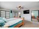 Comfortable main bedroom with large closet, en-suite bathroom, ceiling fan and soothing color scheme at 216 Candlelight St, Las Vegas, NV 89145