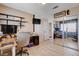Neutral toned office space with open shelving and mirrored closet at 216 Candlelight St, Las Vegas, NV 89145