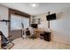 Bright office space with large window, neutral walls, desk and shelving at 216 Candlelight St, Las Vegas, NV 89145
