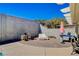 Patio area featuring brickwork, outdoor dining set, and lounge area at 216 Candlelight St, Las Vegas, NV 89145