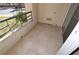 Outdoor balcony featuring tile flooring, metal railing, and an exterior storage closet at 220 E Flamingo Rd # 116, Las Vegas, NV 89169
