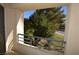 Outdoor balcony with a green tree view and a metal safety railing at 220 E Flamingo Rd # 116, Las Vegas, NV 89169