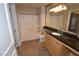Bathroom featuring vanity with granite counters and tub and shower combo at 220 E Flamingo Rd # 116, Las Vegas, NV 89169