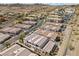 An elevated view showcasing a well-maintained residential community with tile roofs and lush landscaping near desert hills at 262 Big Horn Dr, Boulder City, NV 89005