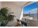 Relaxing balcony with scenic views, seating, and tropical plants at 262 Big Horn Dr, Boulder City, NV 89005