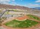 Overhead shot of a baseball field on a sunny day with mountains and lake in the background at 262 Big Horn Dr, Boulder City, NV 89005