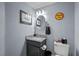 Small, stylish bathroom with a granite countertop and unique decor at 262 Big Horn Dr, Boulder City, NV 89005