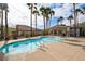 Lovely community pool featuring poolside seating and palm trees at 262 Big Horn Dr, Boulder City, NV 89005