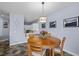 Inviting dining area with wood table, chair accents, and stylish pendant lighting at 262 Big Horn Dr, Boulder City, NV 89005