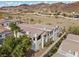 Lovely townhouses presenting well-manicured gardens, ample parking, and attractive facades at 262 Big Horn Dr, Boulder City, NV 89005